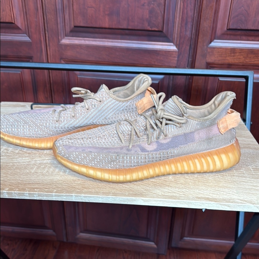 Adidas Yeezy Boost - Tan and Orange Sneakers
Adidas Boost